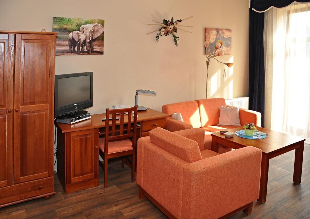 Hotel U Radnice Лоуни Номер фото