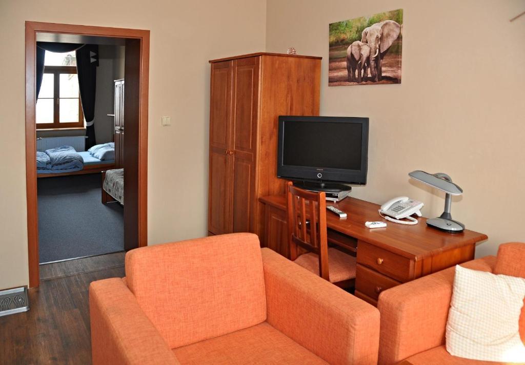 Hotel U Radnice Лоуни Номер фото